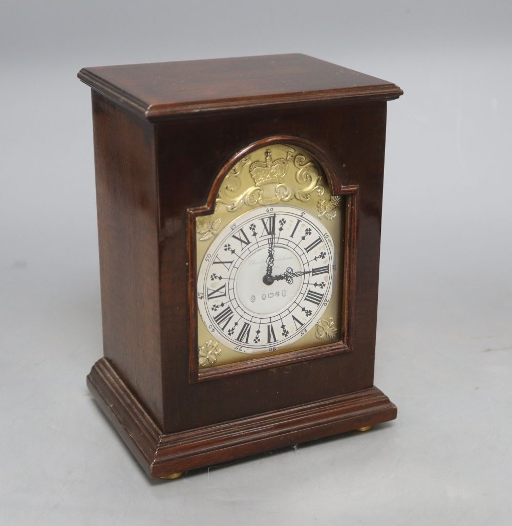 A Silver Jubilee mahogany-cased mantel clock by Charles Frodsham,